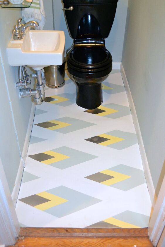 s 30 floor makeovers that will transform any room from the bottom up, Brush up on your geometry with this striking diamond pattern bathroom floor
