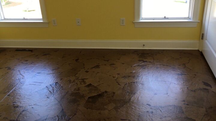 s 30 floor makeovers that will transform any room from the bottom up, Cover your floor with brown craft paper for a crazy cheap faux leather effect