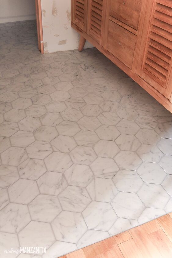 s 30 floor makeovers that will transform any room from the bottom up, Install your own trendy hexagon shaped bathroom floor tiles