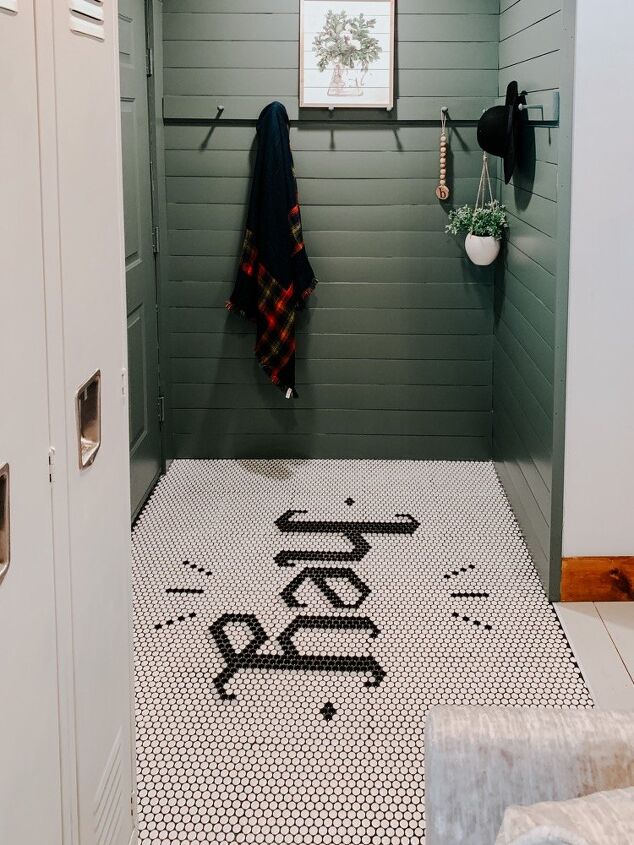 s 30 floor makeovers that will transform any room from the bottom up, Welcome guests with a message written in penny tiles
