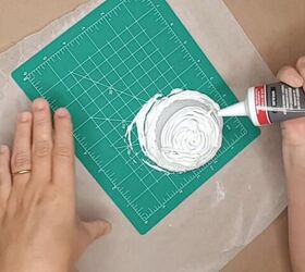 Slather caulk on a styrofoam ball for a surprising winter illusion