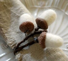 s 20 easy ways to get a gorgeous thanksgiving table, Go rustic this Thanksgiving with dreamy needle felted acorn napkin rings