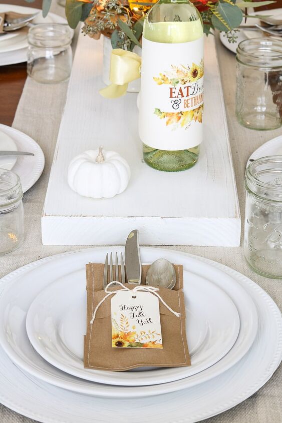s 20 easy ways to get a gorgeous thanksgiving table, Dress up your Thanksgiving table with a rustic craft paper utensil holder