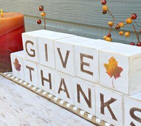 s 20 easy ways to get a gorgeous thanksgiving table, Repurpose toy blocks into reversible wood block signs for the holidays