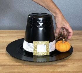 s 20 easy ways to get a gorgeous thanksgiving table, DIY an adorable pilgrim hat centerpiece from an ice bucket and charger