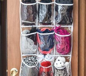15 better ways to keep your winter coats and boots organized, Store winter accessories in a hanging pocket organizer
