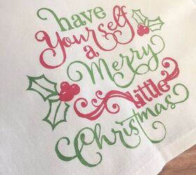 s 30 magical ways to make your home feel more merry and bright, Stencil your own fabric painted Christmas tea towel