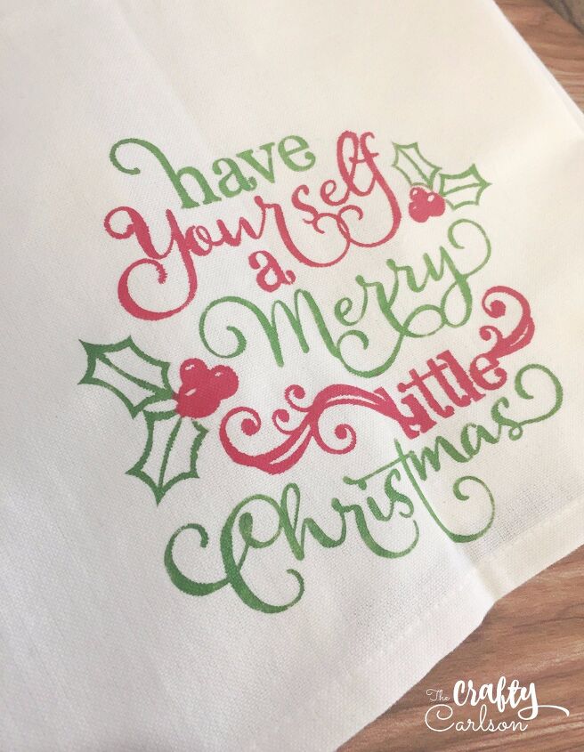 s 30 magical ways to make your home feel more merry and bright, Stencil your own fabric painted Christmas tea towel