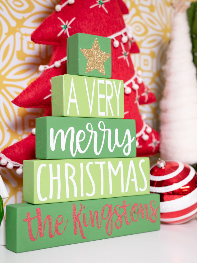 s 30 magical ways to make your home feel more merry and bright, DIY a personalized wood block Christmas tree using a Cricut machine