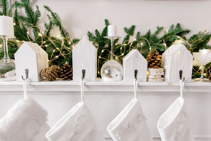 s 30 magical ways to make your home feel more merry and bright, Hang your Christmas stockings from adorable wooden houses