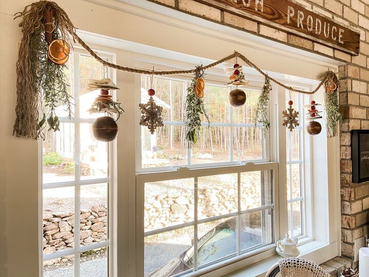 s 30 magical ways to make your home feel more merry and bright, Spice up your seasonal decor with a dried fruit and herb garland