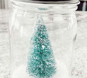 repurposing old candle jars into snow globes