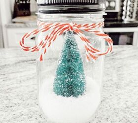 repurposing old candle jars into snow globes