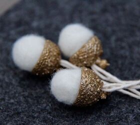 s 25 new christmas ornament ideas that we re totally obsessed with, Add a subtle sparkle to your tree with glittery wool felted acorns