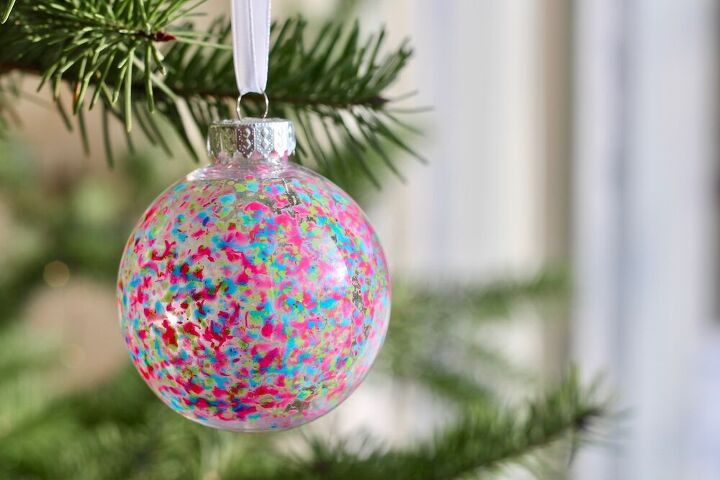 s 25 new christmas ornament ideas that we re totally obsessed with, Add cheerful colors to your tree with melted crayon ornaments