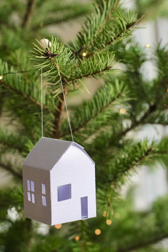 s 25 new christmas ornament ideas that we re totally obsessed with, Celebrate a year of heavy home time with adorable paper house ornaments