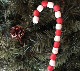 s 25 new christmas ornament ideas that we re totally obsessed with, Sweeten your tree with farmhouse style beaded candy canes