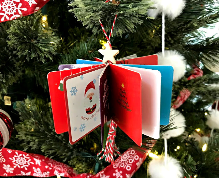 s 25 new christmas ornament ideas that we re totally obsessed with, Make whimsical ornaments from mini Christmas cards