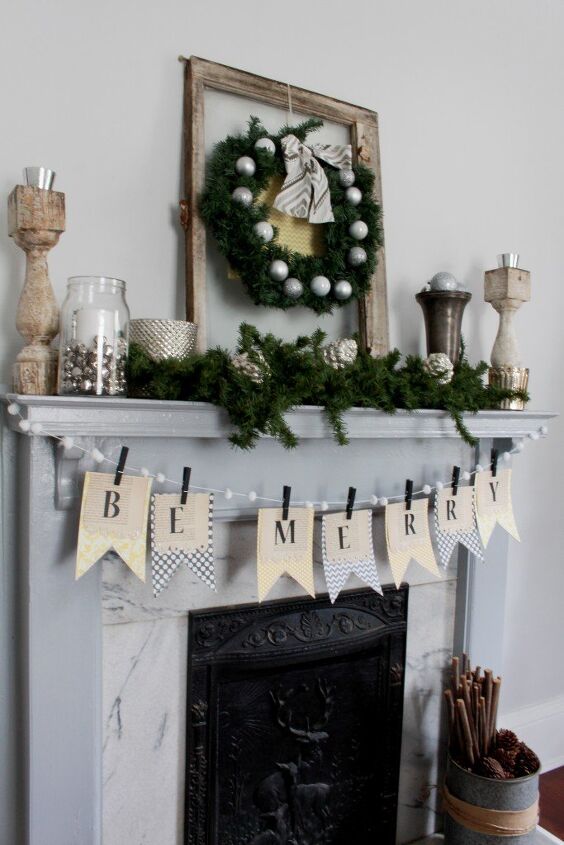 s 19 gorgeous ways to style your mantel for christmas, Deck your mantel with a festive flag banner in nontraditional colors