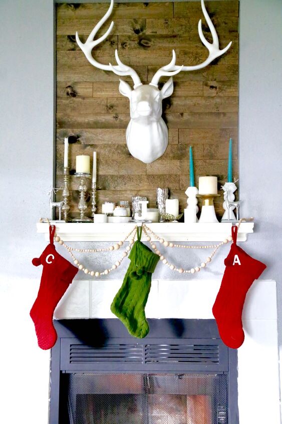 s 19 gorgeous ways to style your mantel for christmas, String up this super easy wood bead garland for your mantel