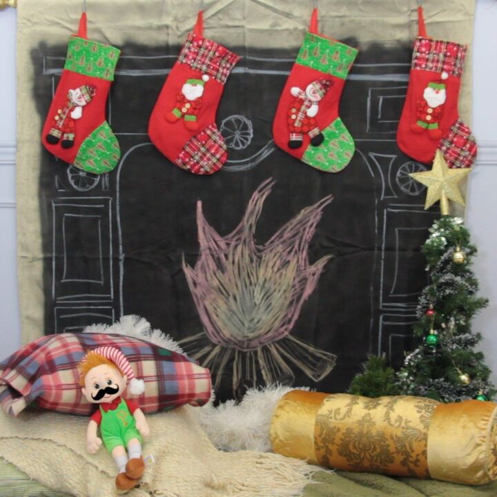 s 19 gorgeous ways to style your mantel for christmas, Sketch your own faux fireplace onto a chalkboard painted curtain