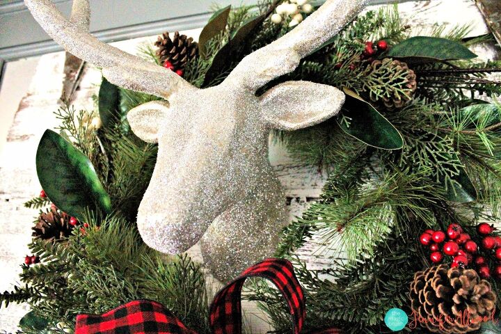 s 19 gorgeous ways to style your mantel for christmas, Make your mantel pop with a stunning sparkly deer head