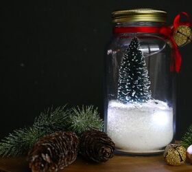 s 15 diy snow globes that make adorable decor and gifts, Brighten up a mason jar Christmas snow globe with micro LED lights