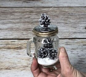 s 15 diy snow globes that make adorable decor and gifts, Turn salt and pepper shakers into adorable Christmas snow globes
