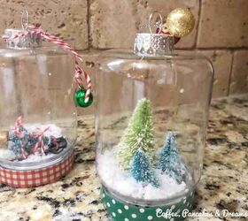 s 15 diy snow globes that make adorable decor and gifts, Up your cute factor this Christmas with mini snow globe ornaments