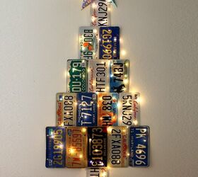 s 15 alternative christmas trees you need to see before december, Upcycle old license plates into a ruggedly charming Christmas tree
