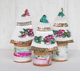 s 15 alternative christmas trees you need to see before december, Upcycle china plates and wooden spools into adorable mini trees