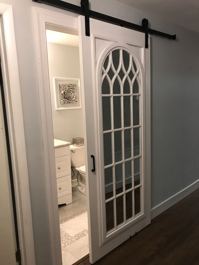 s 17 of our favorite diy barn doors right now, Transform your space with a cathedral mirror barn door