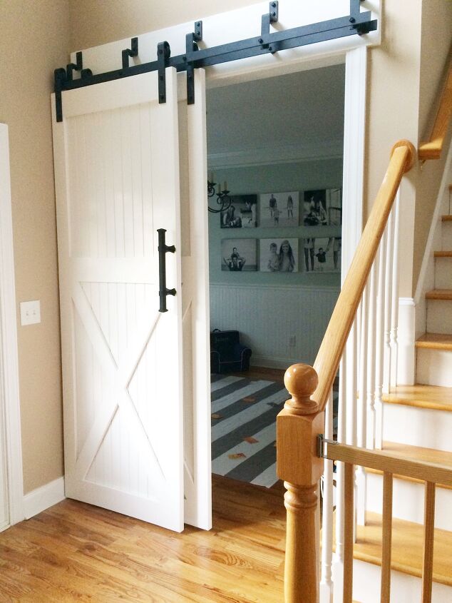 s 17 of our favorite diy barn doors right now, Hide a messy playroom with large white barn doors