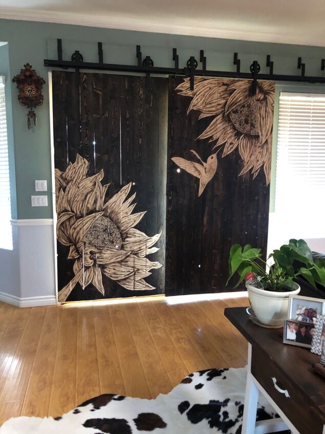 s 17 of our favorite diy barn doors right now, Stain a gorgeous mural onto massive DIY barn doors