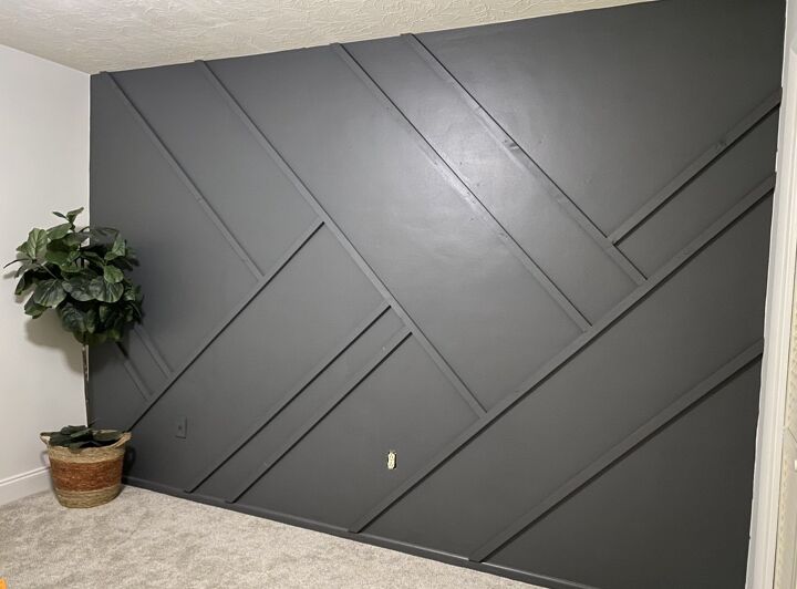 22 ways to make your walls look better for video calls, Go bold with a dark geometric accent wall