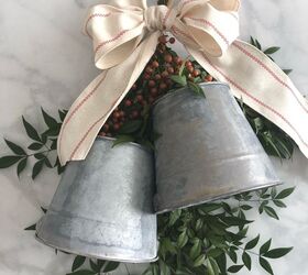 10 beautiful diy bells that will make your holiday home magical, Repurpose galvanized buckets into faux bell wreath