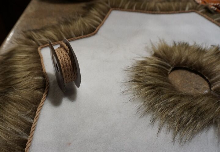 20 tree collars and skirts you re going to love this year, Create a soft look with a felt and fur trimmed tree skirt