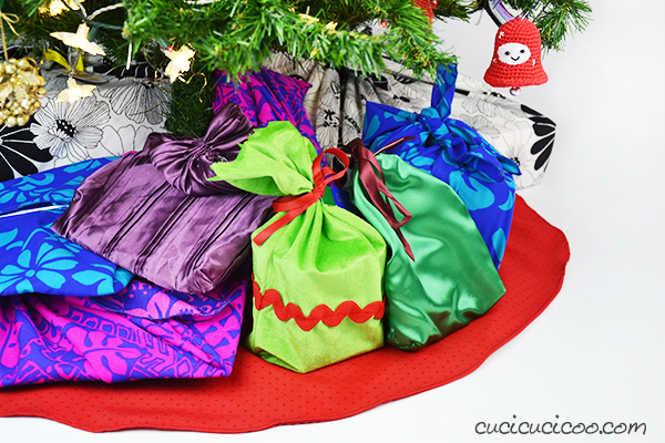 20 tree collars and skirts you re going to love this year, Repurpose an old tablecloth into a lovely Christmas tree skirt