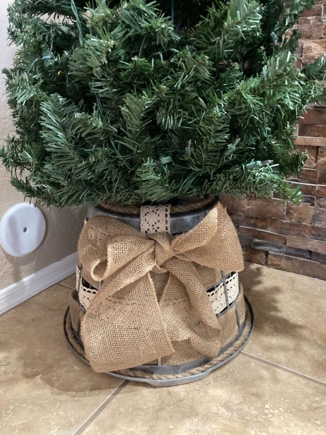 20 tree collars and skirts you re going to love this year, Repurpose a laundry basket into a faux galvanized metal tree skirt