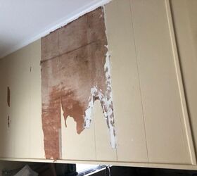water damage to trendy metal wall, Removed damaged wood