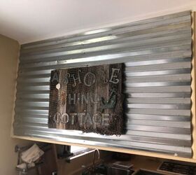 water damage to trendy metal wall, Adding metal to wall