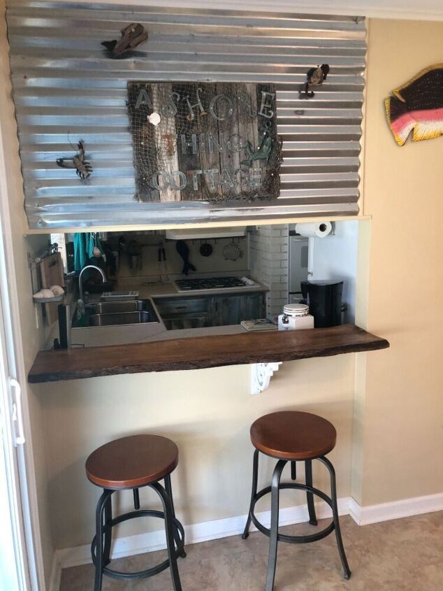 water damage to trendy metal wall, Adding character to my bar