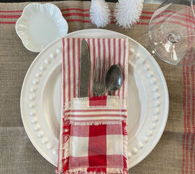 s 16 farmhouse holiday decor ideas that ll make you swoon, DIY these festive ticking fabric napkins with an adorable cutlery pocket
