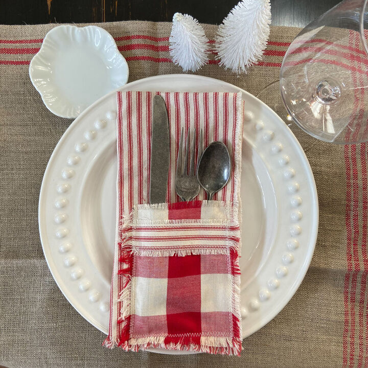 s 16 farmhouse holiday decor ideas that ll make you swoon, DIY these festive ticking fabric napkins with an adorable cutlery pocket