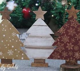 s 16 farmhouse holiday decor ideas that ll make you swoon, Turn simple ornaments into distressed wood Christmas trees