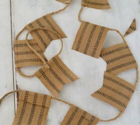s 16 farmhouse holiday decor ideas that ll make you swoon, Add a rustic touch to your tree with a jute and twine garland