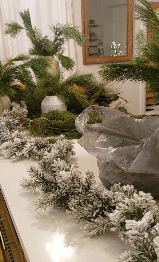 do this to your faux garland and tip to keep your real ones fresh, Lay your garland flat