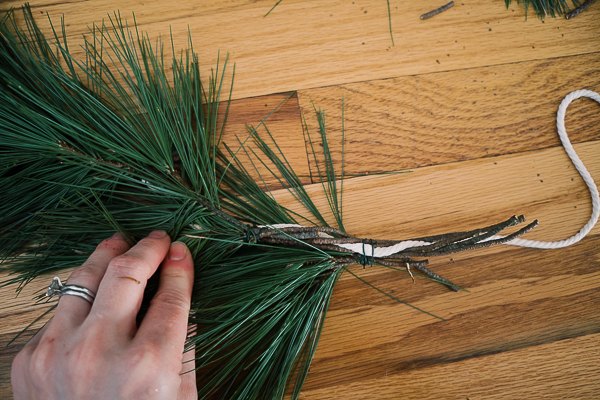 taper candles centerpiece with diy natural evergreen garland