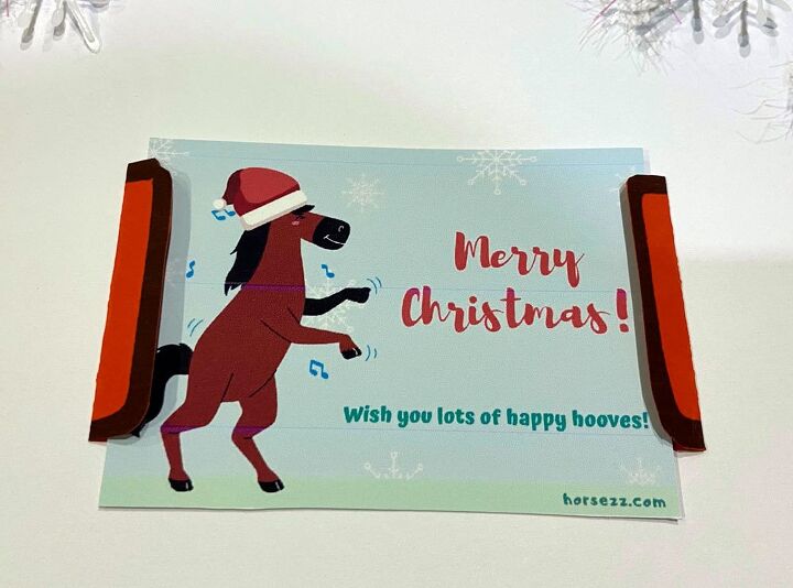 una felicitacin navidea que gustar a todos los jinetes, Coloca la tarjeta en el tarjetero