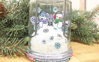 Cartão de natal com globo de neve de uma jarra reciclada